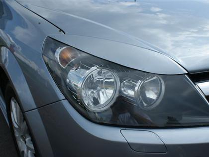 Mračítka předních světel Opel Astra H