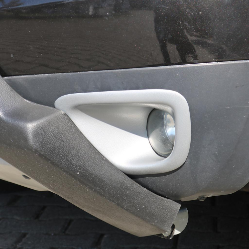 Stříbrné rámečky předních mlhových světel Dacia Duster I